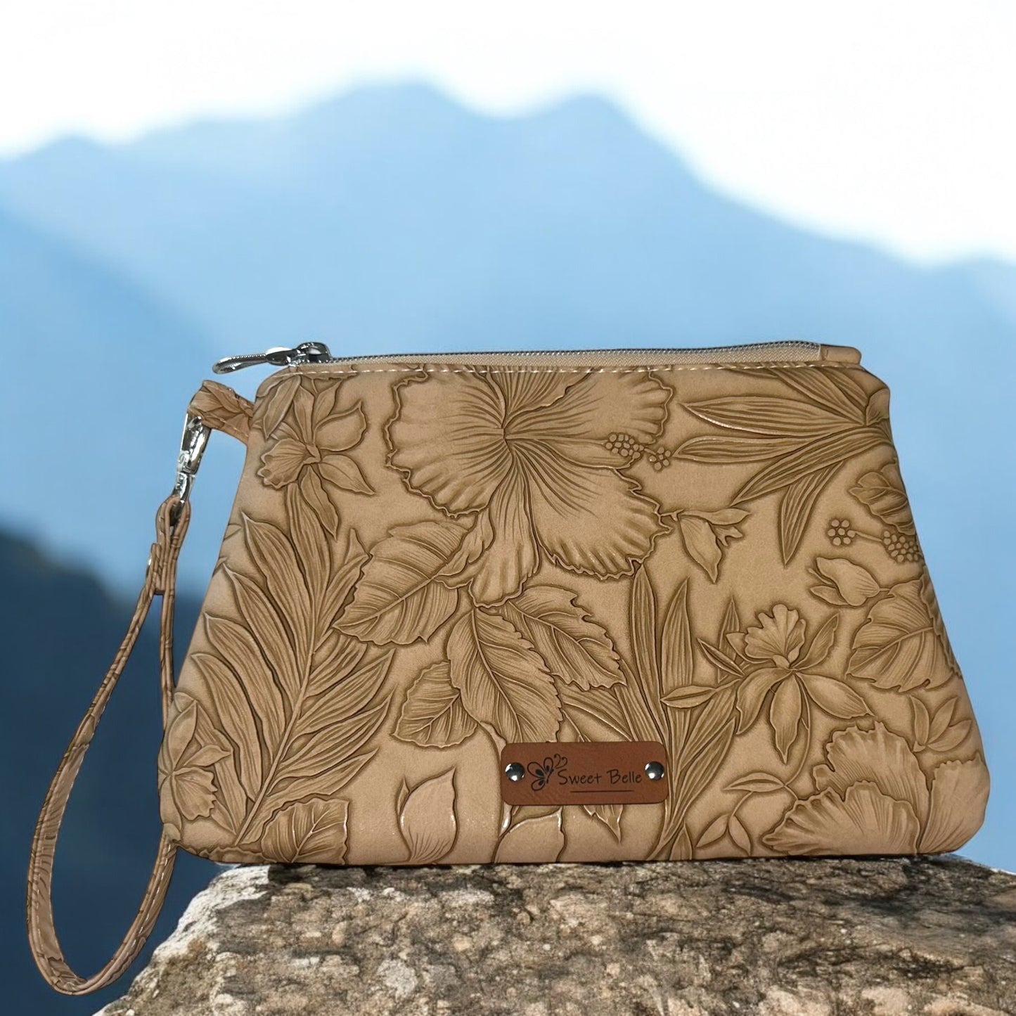 Sand Flower Embossed Curved Wristlet