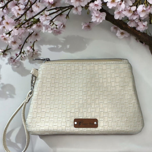 Ivory Weave Curved Wristlet