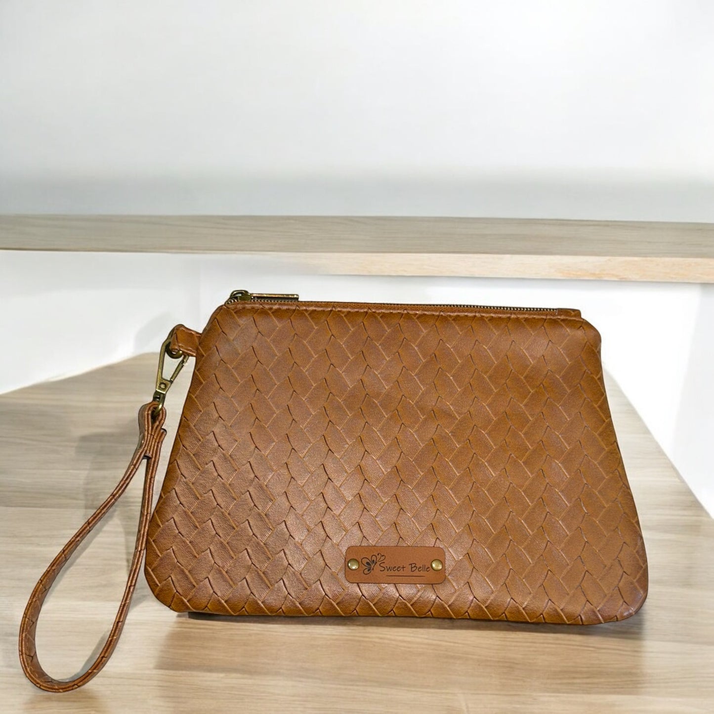 Cinnamon Weave Curved Wristlet