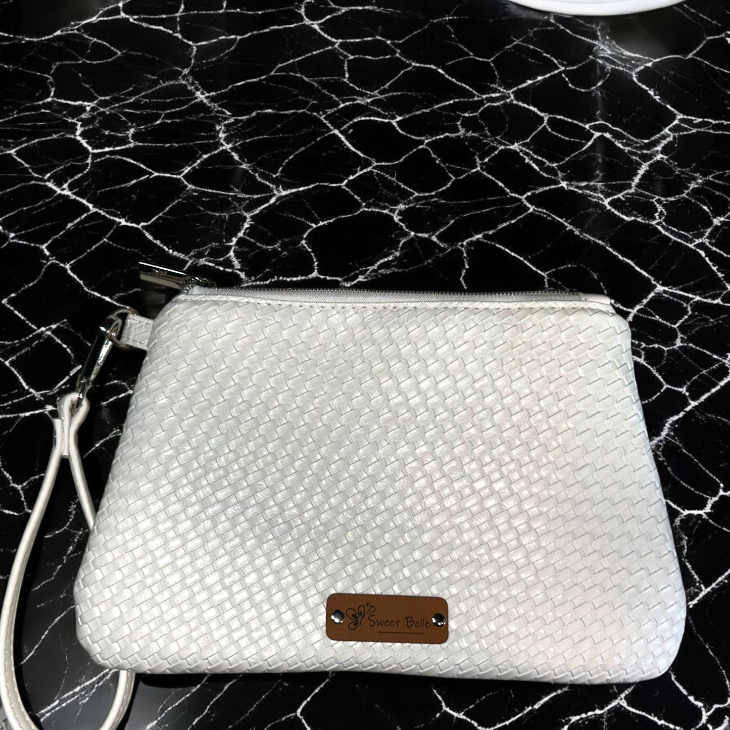 White Weave Curved Wristlet